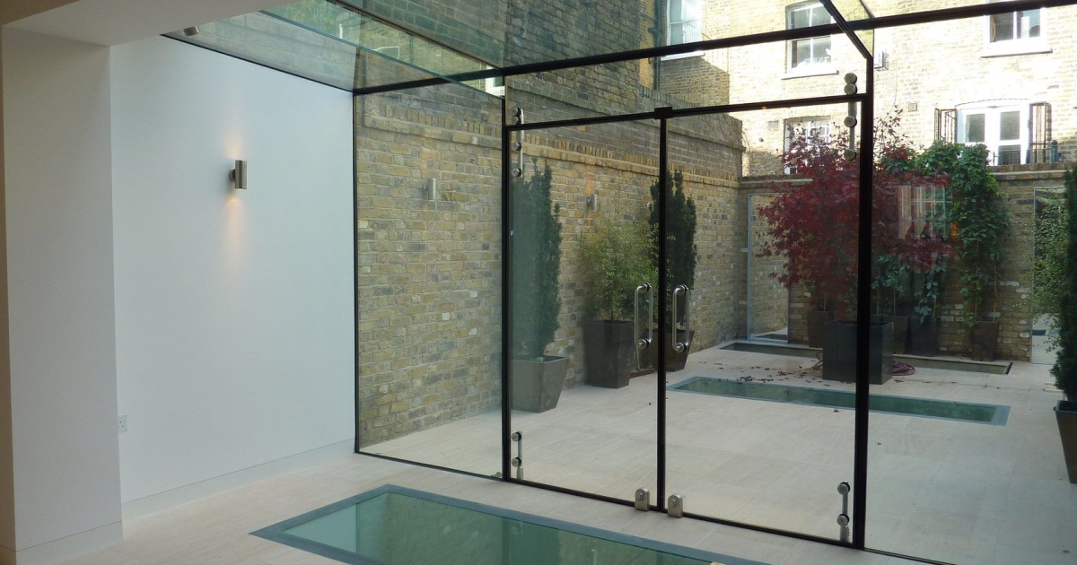 Bespoke modern frameless glass extensions